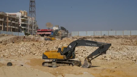 Excavator working close to the site boundary at BeauRivage Plaza
