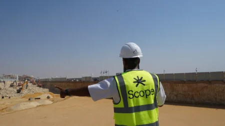 Scope site engineer indicating the excavation line at BeauRivage Plaza