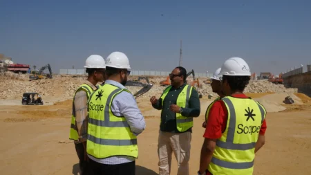 Scope site team in discussion on the BeauRivage Plaza excavation
